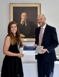 Natasha received her certificate from Ashley