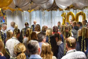 Staff in the Wells Suite Celebrating UCEM's centenary year