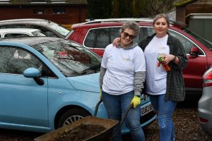 Two staff members in the Purley Park garden