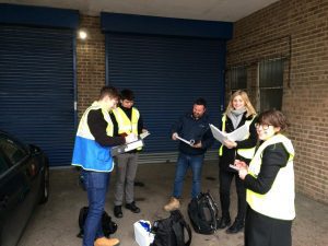 Daniel with graduates on site in Watford