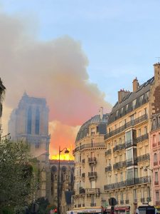 A view of the fire and smoke from a nearby street