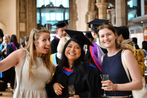 A recent graduate with her family/friends soon after the UCEM graduation ceremony that took place in Reading Town Hall