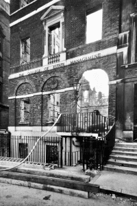 Another post-war photo of 35 Lincoln's Inn Fields showing the damage done to the external of the building though with the lamp intact
