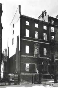 A photo showing the outside of 35 Lincoln's Inn Fields - essentially a shell of a building following incendiary bombing during the Second World War