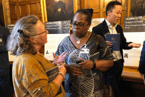 Two ladies speaking in our exhibition space