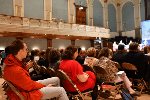 The audience listening intently