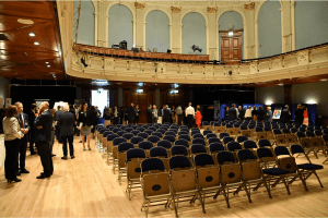 Guests milling in the Concert Halll before the panel talks