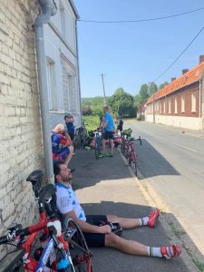 Lee taking a breather on a pavement