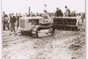 CEM alumna, Doreen Thorp, demonstrating the work of the Women's Land Army during WW2