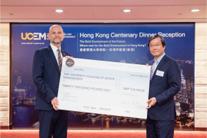 UCEM Principal, Ashley Wheaton, with alumnus, Dr Albert So and his cheque for £20,000 to go towards UCEM's centenary fund