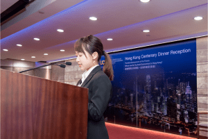 A CityU student gives a speech thanking UCEM on behalf of her peers for the CityU scholarships