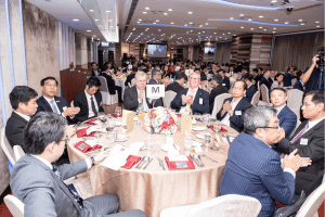 Guests clapping at our Hong Kong centenary event