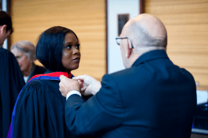 A graduand preparing for the December 2019 UCEM Graduation
