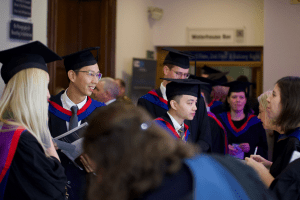 Graduands registering before the December 2019 UCEM Graduation ceremony