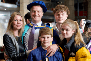 Honorary Doctorate recipient, Ciaran Bird, with his family at the December 2019 UCEM Graduation