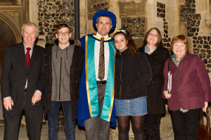 Honorary Doctorate recipient, Craig Bennett, with his family at the December 2019 UCEM Graduation