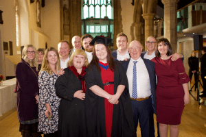Happy family photo at the December 2019 UCEM Graduation