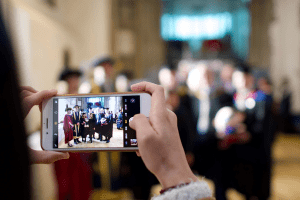 A group pose for a photo at the December 2019 UCEM Graduation