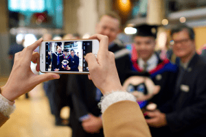 A group pose for a photo at the December 2019 UCEM Graduation