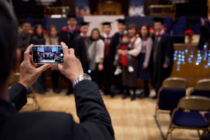 A group posing for a photo at the December 2019 UCEM Graduation