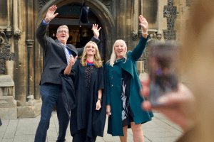 A group pose for a photo at the December 2019 Graduation