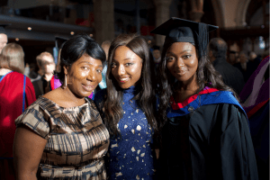 A group pose for a photo at the December 2019 UCEM Graduation