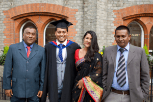 A group pose for a photo at the December 2019 UCEM Graduation