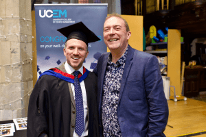 A group pose for a photo at the December 2019 UCEM Graduation