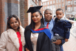 A group pose for a photo at the December 2019 UCEM Graduation