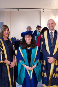 UCEM Deputy Principal, Jane Fawkes, and Principal, Ashley Wheaton, with Honorary Doctorate recipient, Sherin Aminossehe, before the December 2019 UCEM Graduation