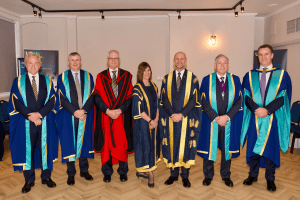 UCEM Vice Chair, Dr Stephen Jackson, Deputy Principal, Jane Fawkes, and Principal, Ashley Wheaton, with new Honorary Fellows, Ben Bolgar, Adam Marks and Graham Chase, as well as Honorary Doctorate recipient, Ciaran Bird, at the December 2019 UCEM Graduation