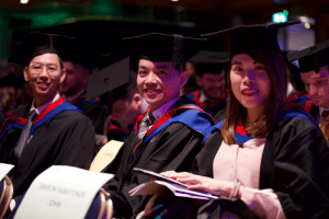 A group of graduands sat down before the December 2019 UCEM Graduation ceremony begins