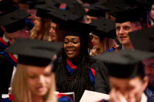 A group of graduands sat down before the December 2019 UCEM Graduation ceremony begins