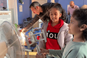 Kids try out the wind turbine