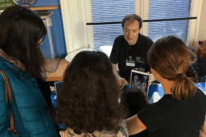 MSc Building Surveying Programme Leader, James Ritson, demonstrating thermal imaging to a family