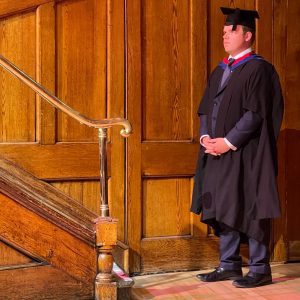 A graduand waits to be called up to the stage