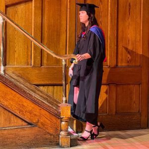 A graduand waits to be called up to the stage