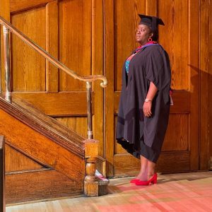 A graduand waits to be called up to the stage