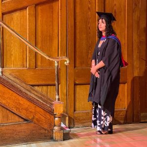 A graduand waits to be called up to the stage
