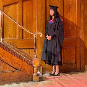 A graduand waits to be called up to the stage