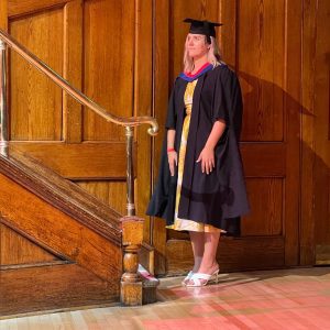 A graduand waits to be called up to the stage