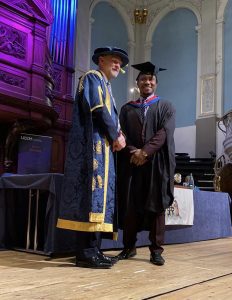 A graduand on the stage