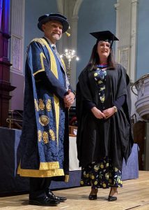 A graduand on the stage