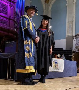 A graduand on the stage