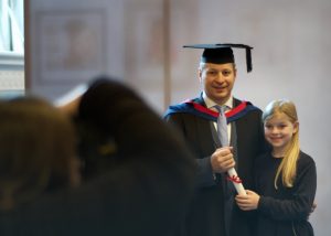 A graduand with his daughter