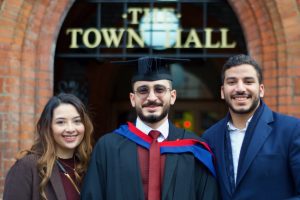 A graduand with his guests