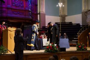 A graduand on the stage