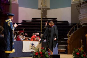 A graduand on the stage