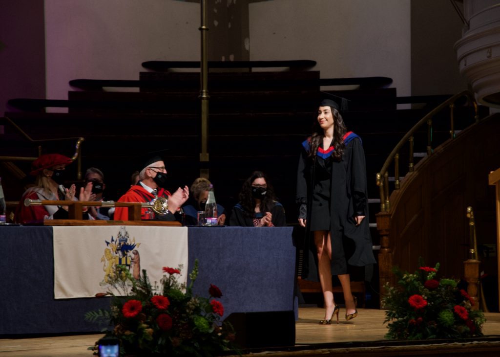 A graduand on the stage