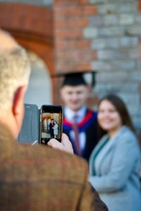 A graduand with his guest